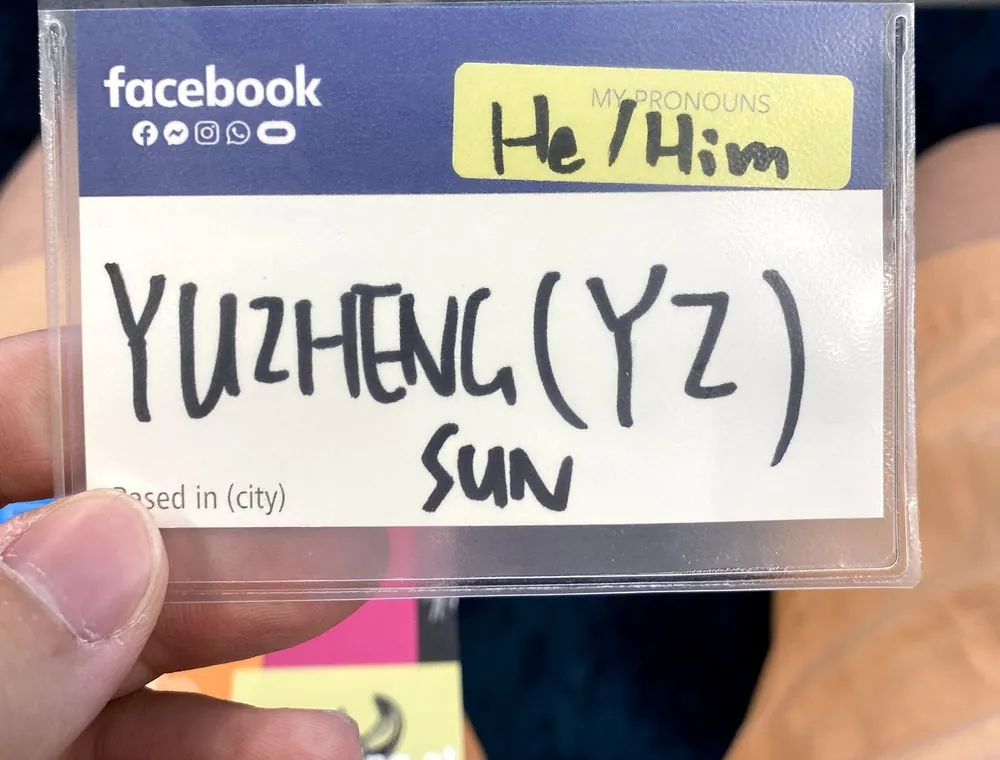 A Facebook new-hire name badge that reads Yuzheng (YZ) Sun